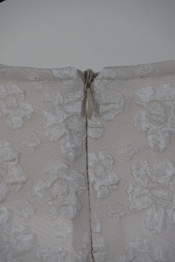 1025 beige achterkant Rits